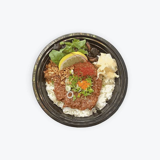 Rice bowl at Gyo Gyo En topped with ikura, chopped tuna and greens
