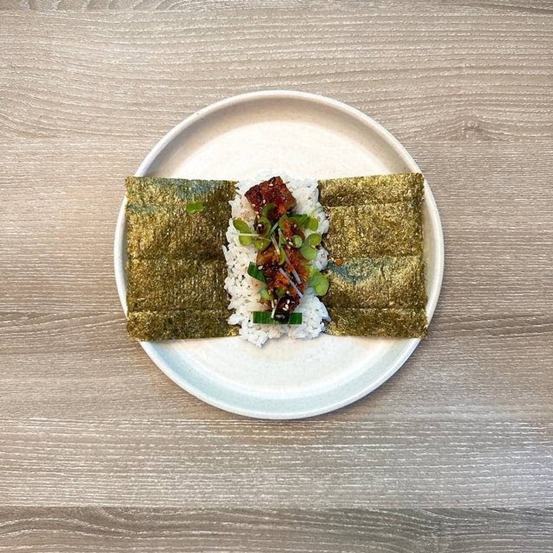 Unagi kyuri hand roll at Gyo Gyo En: seared eel, cucumber and kaiware radish on sushi rice and nori